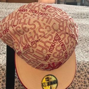 Red and white new York hat